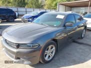 ✅ 2020 Dodge Charger SXT • VIN: 2C3CDXBGXLH160802 • Lot: 43514838. Listed on IAAI with 77,242 mi. Free auction sales archive from the USA and detailed vehicle history report at DreamBid. Image 2.