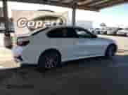 2020 BMW 3 Series 330i with VIN 3MW5R1J09L8B38465, listed as a Copart auction lot 82402015 with 58,796 mi miles and Salvage title. Bid and sale history available at DreamBid. Image 3.