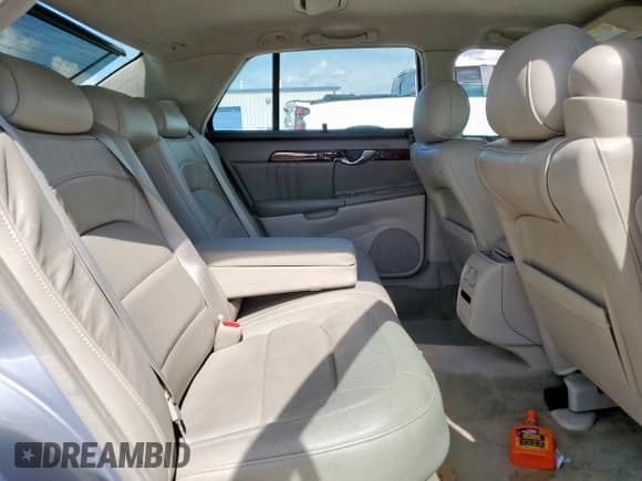 ✅ 2004 Cadillac DeVille DHS • VIN: 1G6KE54Y74U220213 • Lot: 64277385. Listed on Copart with 142,344 mi. Free auction sales archive from the USA and detailed vehicle history report at DreamBid. Image 10.