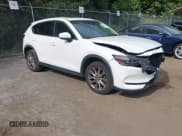 ✅ 2020 Mazda CX-5 Grand Touring • VIN: JM3KFBDM1L1767197 • Lot: 43378286. Listed on IAAI with 71,078 mi. Free auction sales archive from the USA and detailed vehicle history report at DreamBid. Image 1.