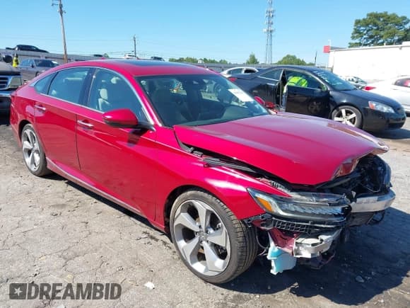 ✅ 2018 Honda Accord Touring • VIN: 1HGCV1F94JA033915 • Lot: 43065230. Listed on IAAI with 86,209 mi. Free auction sales archive from the USA and detailed vehicle history report at DreamBid. Image 1.