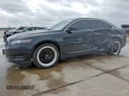 ✅ 2014 Ford Taurus SHO • VIN: 1FAHP2KT4EG106957 • Lot: 59364185. Listed on Copart with 113,704 mi. Free auction sales archive from the USA and detailed vehicle history report at DreamBid. Image 1.