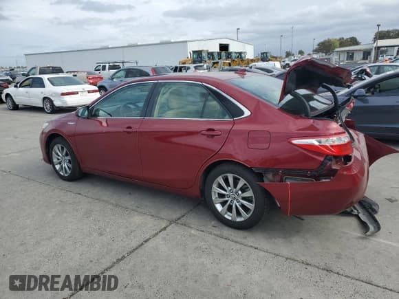 ✅ 2015 Toyota Camry LE • VIN: 4T1BD1FK1FU168514 • Lot: 82634305. Listed on Copart with 67,082 mi. Free auction sales archive from the USA and detailed vehicle history report at DreamBid. Image 2.