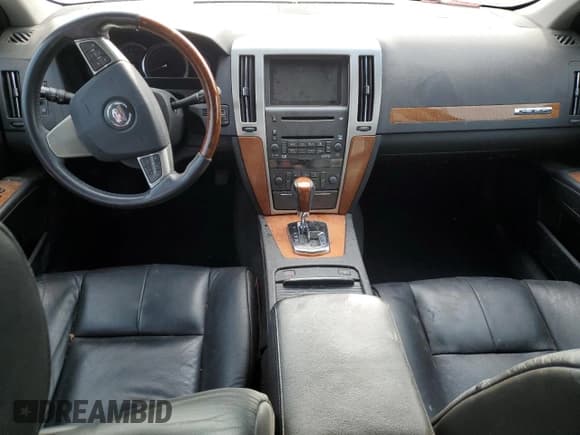 ✅ 2008 Cadillac STS RWD • VIN: 1G6DC67A180123640 • Lot: 71204034. Wystawiony na Copart z przebiegiem Nie podano. Bezpłatny archiwum sprzedaży aukcyjnych z USA i szczegółowy raport historii pojazdu na DreamBid. Zdjęcie 8.