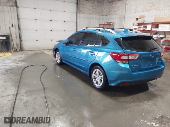 ✅ 2018 Subaru Impreza Premium • VIN: 4S3GTAB69J3713010 • Lot: 43599160. Listed on IAAI with 43,964 mi. Free auction sales archive from the USA and detailed vehicle history report at DreamBid. Image 3.
