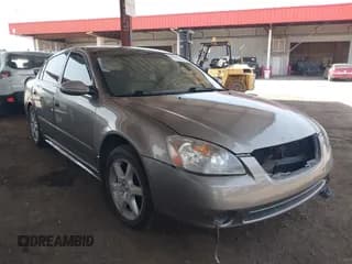 ✅ 2003 Nissan Altima SE • VIN: 1N4BL11D93C317727 • Лот: 42629760. Опубликован ранее на IAAI с пробегом 176 591 миль. Бесплатный доступ к архиву аукционных продаж из США и подробный отчёт об истории автомобиля на DreamBid. Изображение 1.