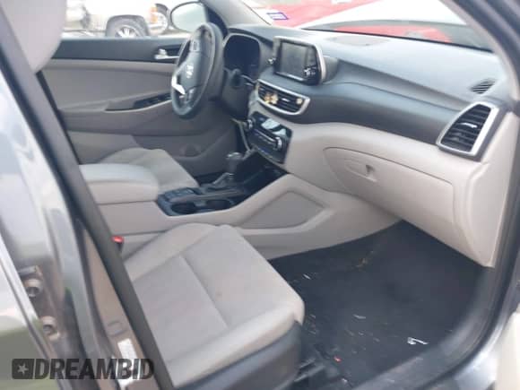 2019 Hyundai Tucson Value with VIN KM8J33A49KU955529, listed as a IAAI auction lot 42947554 with 81,614 mi miles and . Bid and sale history available at DreamBid. Image 5.