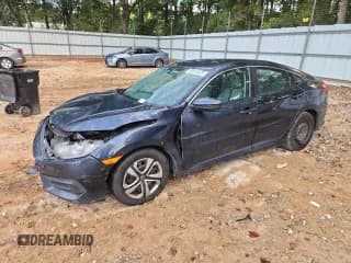 ✅ 2016 Honda Civic LX • VIN: 19XFC2F52GE034524 • Lot: 84631585. Listed on Copart with 124,514 mi. Free auction sales archive from the USA and detailed vehicle history report at DreamBid. Image 1.