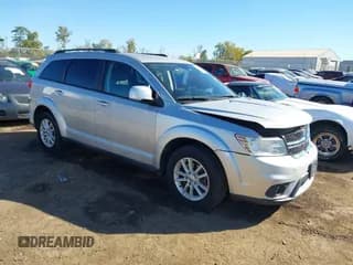 ✅ 2014 Dodge Journey SXT • VIN: 3C4PDDBG4ET113240 • Lot: 43377603. Listed on IAAI with 205,729 mi. Free auction sales archive from the USA and detailed vehicle history report at DreamBid. Image 1.