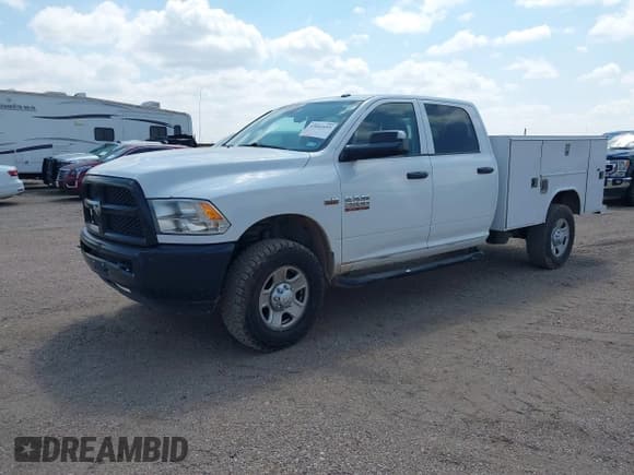✅ 2016 Ram 2500 Tradesman • VIN: 3C7WR5HT0GG125424 • Lot: 43041693. Wystawiony na IAAI z przebiegiem 171 693 mil. Bezpłatny archiwum sprzedaży aukcyjnych z USA i szczegółowy raport historii pojazdu na DreamBid. Zdjęcie 17.
