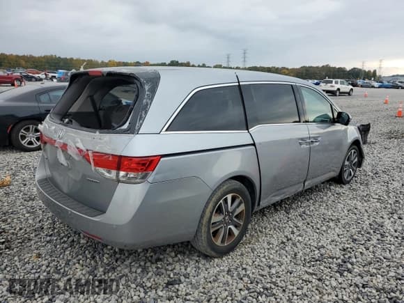 ✅ 2017 Honda Odyssey Touring • VIN: 5FNRL5H98HB023702 • Лот: 92070925. Опубликован ранее на Copart с пробегом 191 772 миль. Бесплатный доступ к архиву аукционных продаж из США и подробный отчёт об истории автомобиля на DreamBid. Изображение 3.