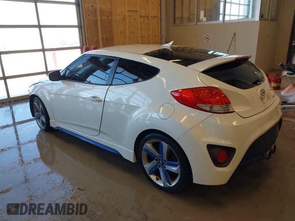 ✅ 2013 Hyundai Veloster Turbo • VIN: KMHTC6AE8DU085262 • Lot: 41607267. Listed on IAAI with 200,159 mi. Free auction sales archive from the USA and detailed vehicle history report at DreamBid. Image 3.