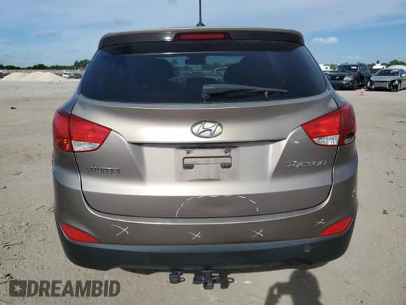 2013 Hyundai Tucson GL z VIN KM8JT3AB5DU654984, wystawiony jako Copart lot #72258644 z przebiegiem 123 394 mil mil oraz Szkoda całkowita • Salvage title. Historia ofert i sprzedaży dostępna na DreamBid. Obrazek 6.