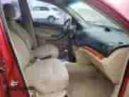 2011 Chevrolet Aveo 1LT z VIN KL1TD6DEXBB132191, wystawiony jako Copart lot #87774475 z przebiegiem 102 416 mil mil oraz Czysty tytuł • Clean title. Historia ofert i sprzedaży dostępna na DreamBid. Obrazek 7.