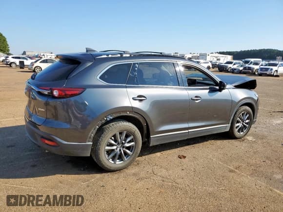✅ 2022 Mazda CX-9 Touring • VIN: JM3TCBCY3N0605629 • Лот: 85759715. Опубликован ранее на Copart с пробегом Не указан. Бесплатный доступ к архиву аукционных продаж из США и подробный отчёт об истории автомобиля на DreamBid. Изображение 3.