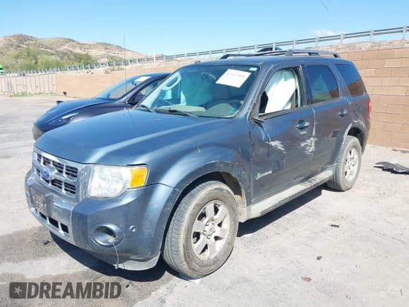 ✅ 2011 Ford Escape Hybrid • VIN: 1FMCU4K36BKC04787 • Lot: 41947008. Wystawiony na IAAI z przebiegiem 132 403 mil. Bezpłatny archiwum sprzedaży aukcyjnych z USA i szczegółowy raport historii pojazdu na DreamBid. Zdjęcie 2.