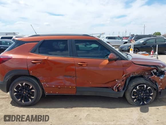 2021 Chevrolet TrailBlazer LT with VIN KL79MPSL6MB067933, listed as a IAAI auction lot 43272421 with 77,332 mi miles and . Bid and sale history available at DreamBid. Image 13.
