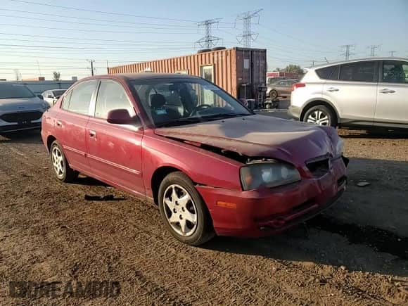 2004 Hyundai Elantra GLS z VIN KMHDN46D44U901502, wystawiony jako Copart lot #74850854 z przebiegiem 80 940 mil mil oraz Szkoda całkowita • Salvage title. Historia ofert i sprzedaży dostępna na DreamBid. Obrazek 11.