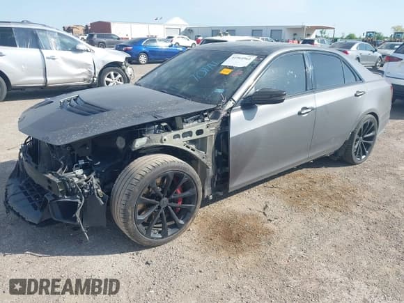 ✅ 2018 Cadillac CTS-V • VIN: 1G6A15S63J0101442 • Lot: 41964961. Listed on IAAI with 87,821 mi. Free auction sales archive from the USA and detailed vehicle history report at DreamBid. Image 2.