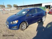 ✅ 2014 Chevrolet Sonic LT • VIN: 1G1JC5SH2E4151507 • Lot: 43611838. Listed on IAAI with 97,460 mi. Free auction sales archive from the USA and detailed vehicle history report at DreamBid. Image 2.