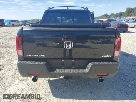 ✅ 2022 Honda Ridgeline Black Edition • VIN: 5FPYK3F82NB000240 • Лот: 64379455. Опубликован ранее на Copart с пробегом 124 404 миль. Бесплатный доступ к архиву аукционных продаж из США и подробный отчёт об истории автомобиля на DreamBid. Изображение 6.