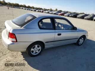 2002 Hyundai Accent with VIN KMHCF35G62U203274, listed as a Copart auction lot 77047834 with 90,442 mi miles and Salvage title. Bid and sale history available at DreamBid. Image 3.