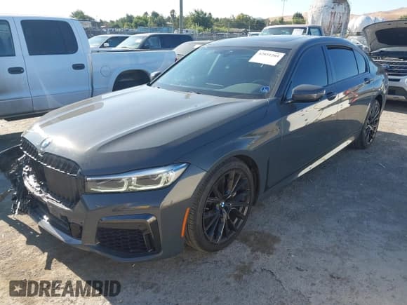 ✅ 2022 BMW 7 Series 740i • VIN: WBA7T2C08NCH69963 • Лот: 42851205. Опубликован ранее на IAAI с пробегом 56 989 миль. Бесплатный доступ к архиву аукционных продаж из США и подробный отчёт об истории автомобиля на DreamBid. Изображение 2.