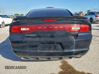✅ 2013 Dodge Charger SE • VIN: 2C3CDXBG9DH624308 • Lot: 94355555. Listed on Copart with 168,425 mi. Free auction sales archive from the USA and detailed vehicle history report at DreamBid. Image 6.