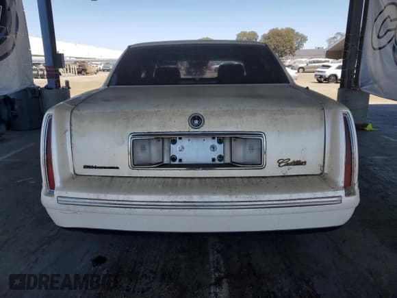 ✅ 1998 Cadillac DeVille • VIN: 1G6KF5496WU745580 • Lot: 69912165. Listed on Copart with 119,649 mi. Free auction sales archive from the USA and detailed vehicle history report at DreamBid. Image 6.
