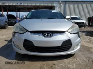 ✅ 2012 Hyundai Veloster w/Red Int • VIN: KMHTC6AD5CU068716 • Lot: 77210664. Wystawiony na Copart z przebiegiem 147 813 mil. Bezpłatny archiwum sprzedaży aukcyjnych z USA i szczegółowy raport historii pojazdu na DreamBid. Zdjęcie 5.