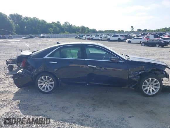 ✅ 2014 Cadillac CTS Luxury RWD • VIN: 1G6AR5SX9E0127759 • Lot: 42273609. Listed on IAAI with 123,885 mi. Free auction sales archive from the USA and detailed vehicle history report at DreamBid. Image 14.