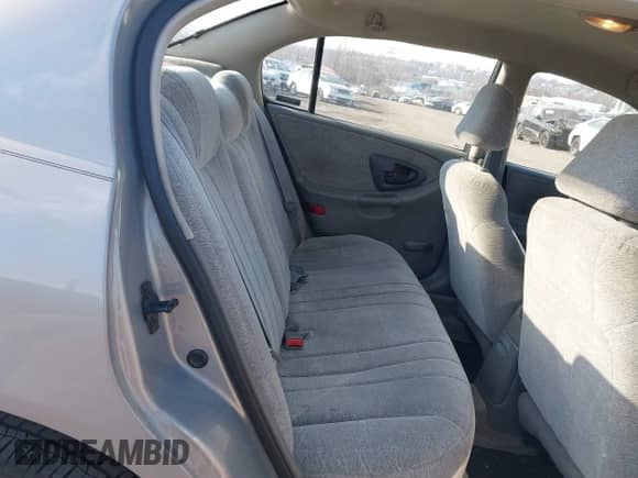 1998 Chevrolet Malibu z VIN 1G1ND52M2W6166719, wystawiony jako IAAI lot #41677518 z przebiegiem 116 689 mil mil oraz . Historia ofert i sprzedaży dostępna na DreamBid. Obrazek 8.