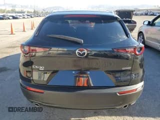 ✅ 2023 Mazda CX-30 S Select • VIN: 3MVDMBBM7PM538542 • Lot: 61454744. Wystawiony na Copart z przebiegiem 16 219 mil. Bezpłatny archiwum sprzedaży aukcyjnych z USA i szczegółowy raport historii pojazdu na DreamBid. Zdjęcie 6.