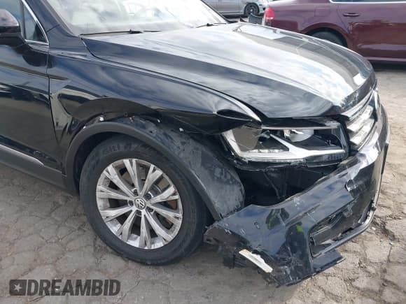 ✅ 2018 Volkswagen Tiguan SEL • VIN: 3VV3B7AX8JM094771 • Лот: 43419406. Опубликован ранее на IAAI с пробегом 54 219 миль. Бесплатный доступ к архиву аукционных продаж из США и подробный отчёт об истории автомобиля на DreamBid. Изображение 6.