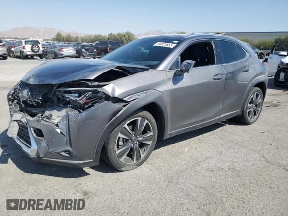 ✅ 2021 Lexus UX 200 • VIN: JTHX3JBH4M2041402 • Лот: 64621655. Опубликован ранее на Copart с пробегом 15 881 миль. Бесплатный доступ к архиву аукционных продаж из США и подробный отчёт об истории автомобиля на DreamBid. Изображение 1.