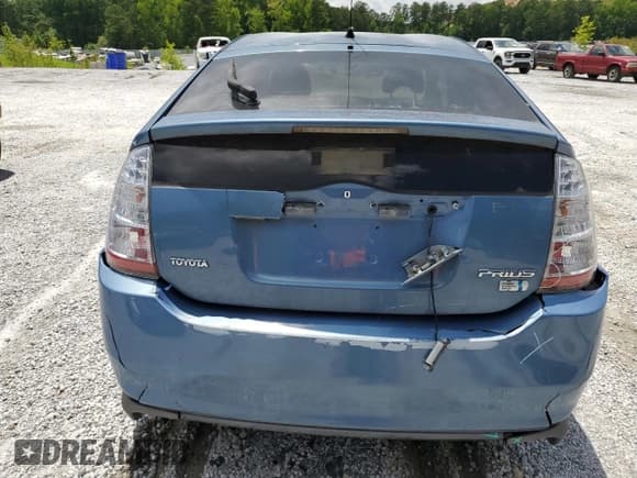 ✅ 2007 Toyota Prius • VIN: JTDKB20UX77690407 • Lot: 60980445. Listed on Copart with 108,686 mi. Free auction sales archive from the USA and detailed vehicle history report at DreamBid. Image 6.