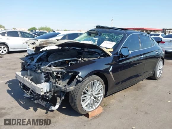 ✅ 2020 Genesis G70 2.0T • VIN: KMTG34LA0LU055791 • Lot: 42612619. Wystawiony na IAAI z przebiegiem 74 582 mil. Bezpłatny archiwum sprzedaży aukcyjnych z USA i szczegółowy raport historii pojazdu na DreamBid. Zdjęcie 17.