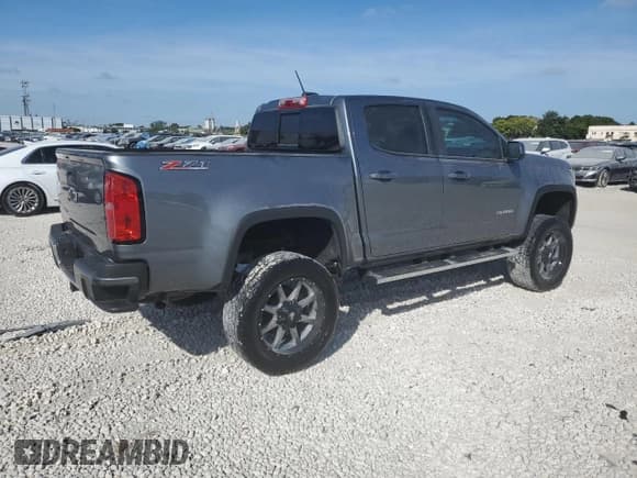 ✅ 2018 Chevrolet Colorado 4WD Z71 • VIN: 1GCGTDEN6J1288071 • Лот: 81923664. Опубликован ранее на Copart с пробегом 118 372 миль. Бесплатный доступ к архиву аукционных продаж из США и подробный отчёт об истории автомобиля на DreamBid. Изображение 3.
