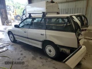 ✅ 1991 Subaru Legacy • VIN: 4S4BJ63C6M7908203 • Lot: 67775835. Listed on Copart with 137,585 mi. Free auction sales archive from the USA and detailed vehicle history report at DreamBid. Image 2.