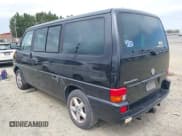 ✅ 2002 Volkswagen EuroVan GLS • VIN: WV2KB47082H014282 • Lot: 41940848. Listed on IAAI with 241,534 mi. Free auction sales archive from the USA and detailed vehicle history report at DreamBid. Image 3.
