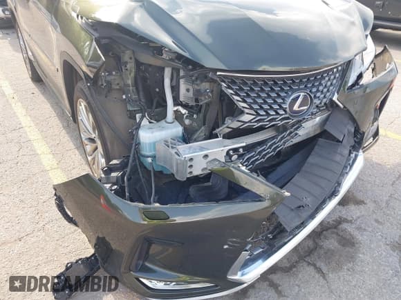 ✅ 2022 Lexus RX 450h • VIN: 2T2JGMDA1NC077818 • Lot: 42568671. Listed on IAAI with 67,734 mi. Free auction sales archive from the USA and detailed vehicle history report at DreamBid. Image 6.