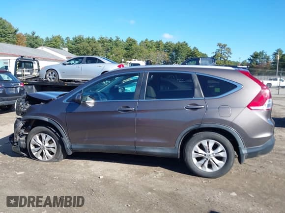 ✅ 2014 Honda CR-V EX-L • VIN: 2HKRM3H74EH556742 • Lot: 43402618. Listed on IAAI with 66,705 mi. Free auction sales archive from the USA and detailed vehicle history report at DreamBid. Image 14.
