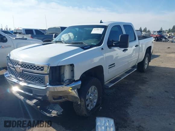 ✅ 2014 Chevrolet Silverado 2500HD LT • VIN: 1GC1KXC80EF116411 • Lot: 41208741. Listed on IAAI with 182,186 mi. Free auction sales archive from the USA and detailed vehicle history report at DreamBid. Image 2.