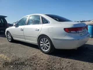 2006 Hyundai Azera SE с VIN KMHFC46F26A136584, выставлен на аукционе Copart как лот 49860275 с пробегом 224 972 миль миль и Списание • Salvage title. История ставок и продаж доступна на DreamBid. Изображение 2.