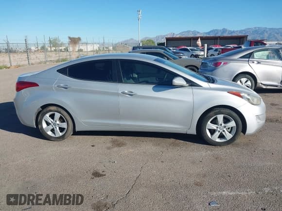 ✅ 2013 Hyundai Elantra GLS • VIN: KMHDH4AE0DU533455 • Lot: 43471630. Listed on IAAI with 71,362 mi. Free auction sales archive from the USA and detailed vehicle history report at DreamBid. Image 13.