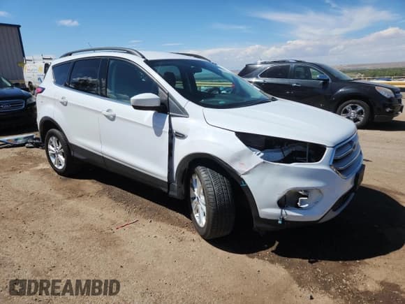 ✅ 2018 Ford Escape SE • VIN: 1FMCU9GD1JUB01911 • Lot: 80621525. Wystawiony na Copart z przebiegiem 91 262 mil. Bezpłatny archiwum sprzedaży aukcyjnych z USA i szczegółowy raport historii pojazdu na DreamBid. Zdjęcie 4.