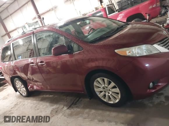 ✅ 2015 Toyota Sienna Limited • VIN: 5TDDK3DC9FS121889 • Lot: 41739208. Listed on IAAI with 194,548 mi. Free auction sales archive from the USA and detailed vehicle history report at DreamBid. Image 13.