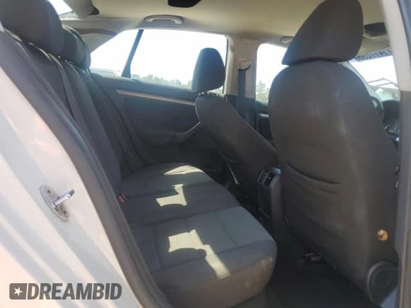 ✅ 2010 Volkswagen Jetta S • VIN: 3VWJX7AJ3AM075822 • Lot: 71417695. Listed on Copart with 214,784 mi. Free auction sales archive from the USA and detailed vehicle history report at DreamBid. Image 10.