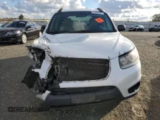 ✅ 2012 Hyundai Santa Fe GLS • VIN: 5XYZGDAB7CG100024 • Lot: 81995244. Listed on Copart with Not provided. Free auction sales archive from the USA and detailed vehicle history report at DreamBid. Image 5.