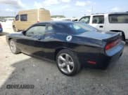 ✅ 2013 Dodge Challenger SXT • VIN: 2C3CDYAG2DH579252 • Lot: 77498104. Wystawiony na Copart z przebiegiem 99 926 mil. Bezpłatny archiwum sprzedaży aukcyjnych z USA i szczegółowy raport historii pojazdu na DreamBid. Zdjęcie 2.